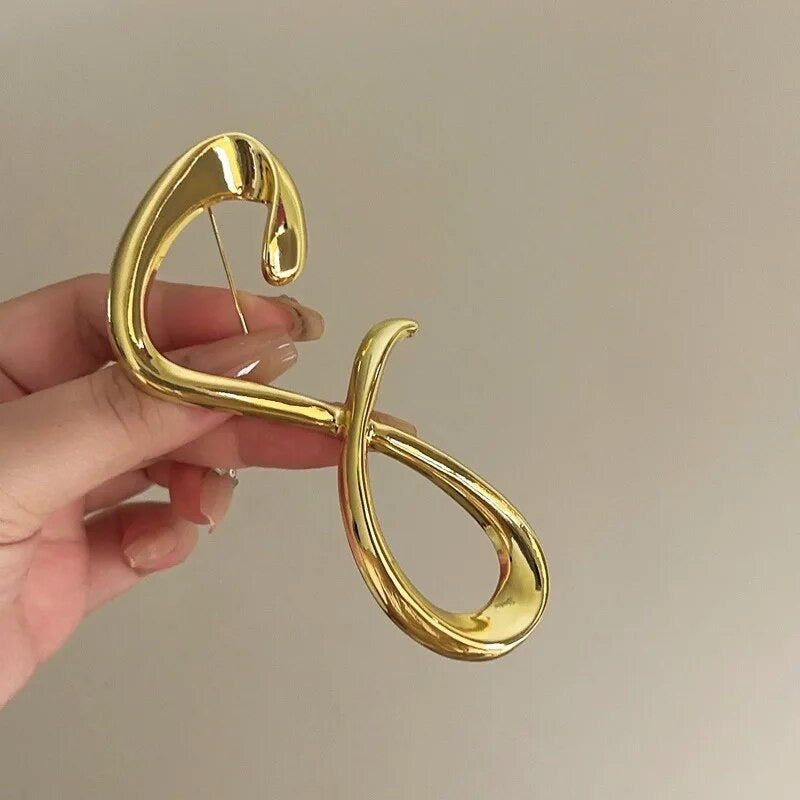 Sil brooch
