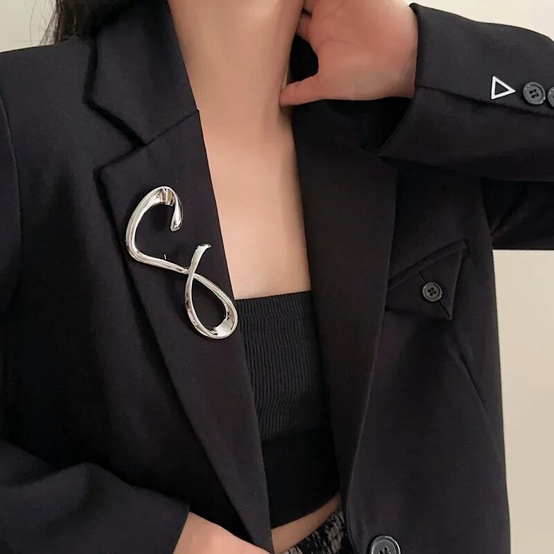 Sil brooch