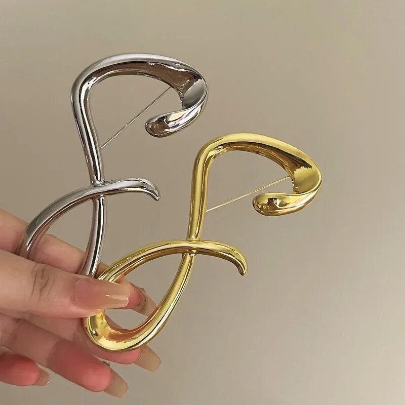Sil brooch